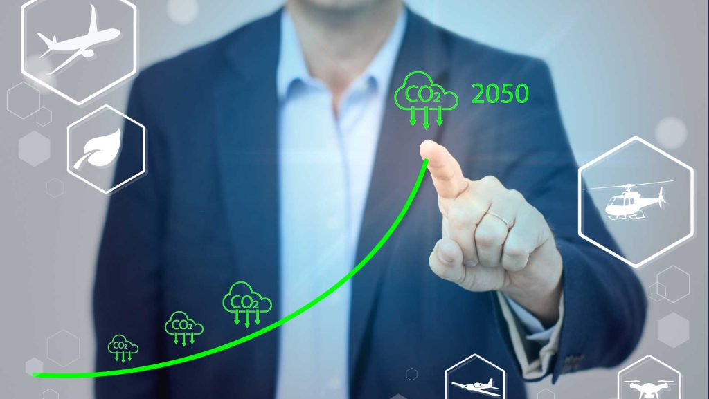 Schmuckbild: Finger zeigt Kurve für CO2-Außstoß bis 2050